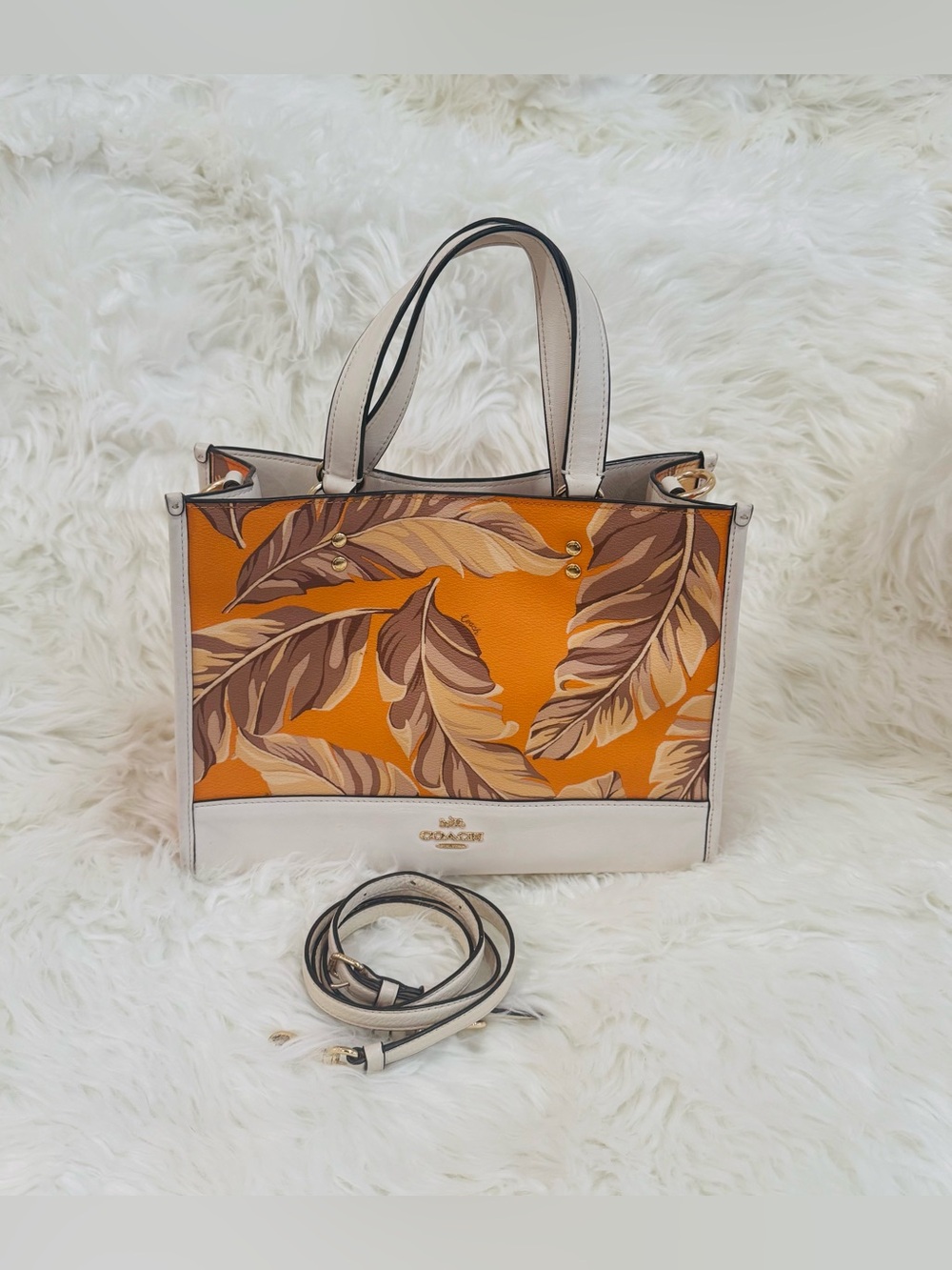 Coach Dempsey Carryall With Banana Leaves Print in orange. Pre Owned No Hangtag.